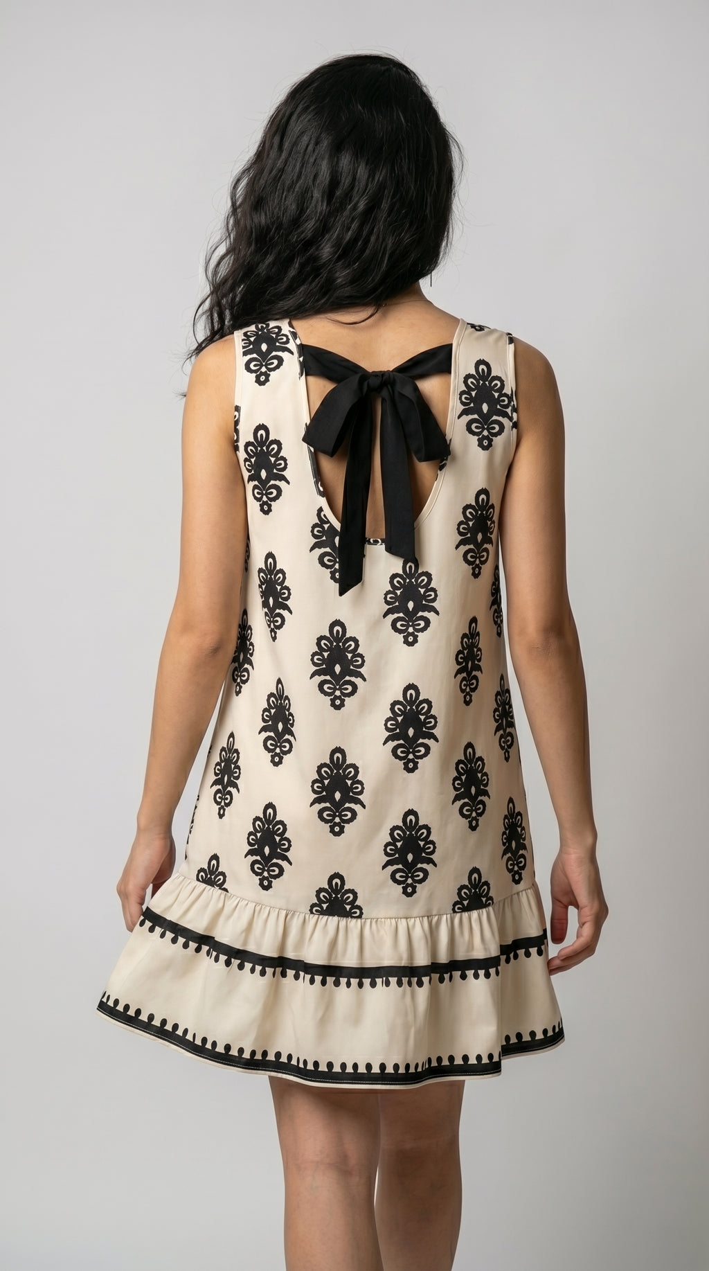 The Ivory Mosaic Hollowed Bowknot Back Mini Dress